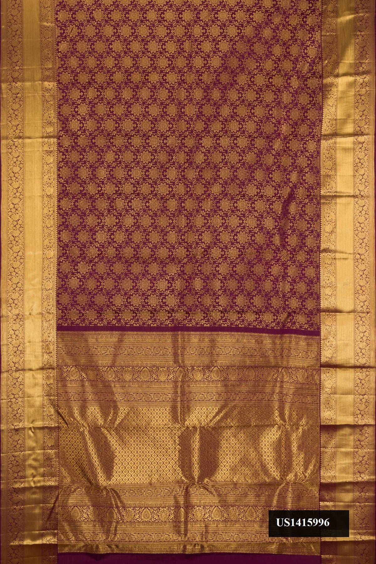 Maroon Dual Tone Kanchipuram Silk Saree with Zari Brocade on the body and Zari Border.  displayed on a mannequin