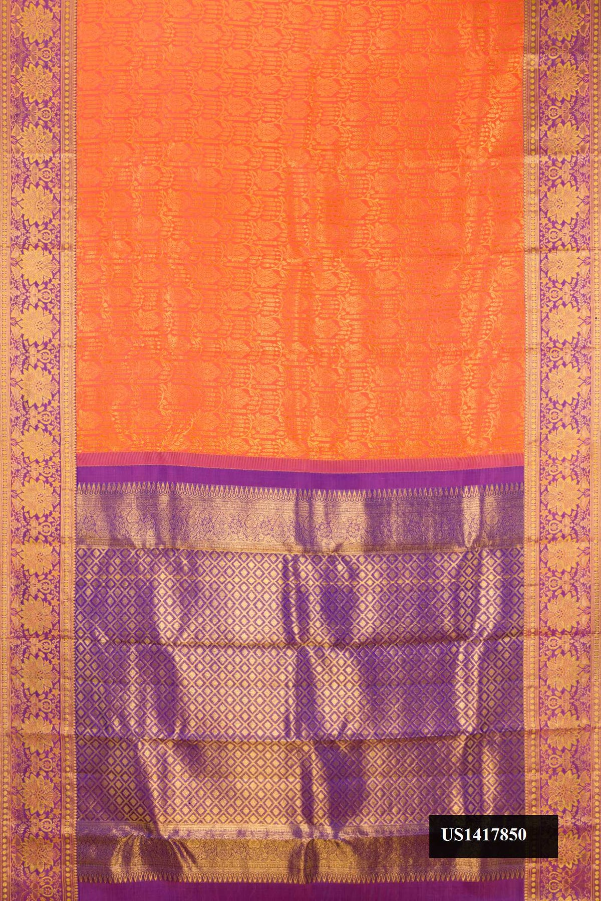 Orange Dual Tone Kanchipuram Silk Saree with Zari Brocade on the body and Fancy Border.  displayed on a mannequin