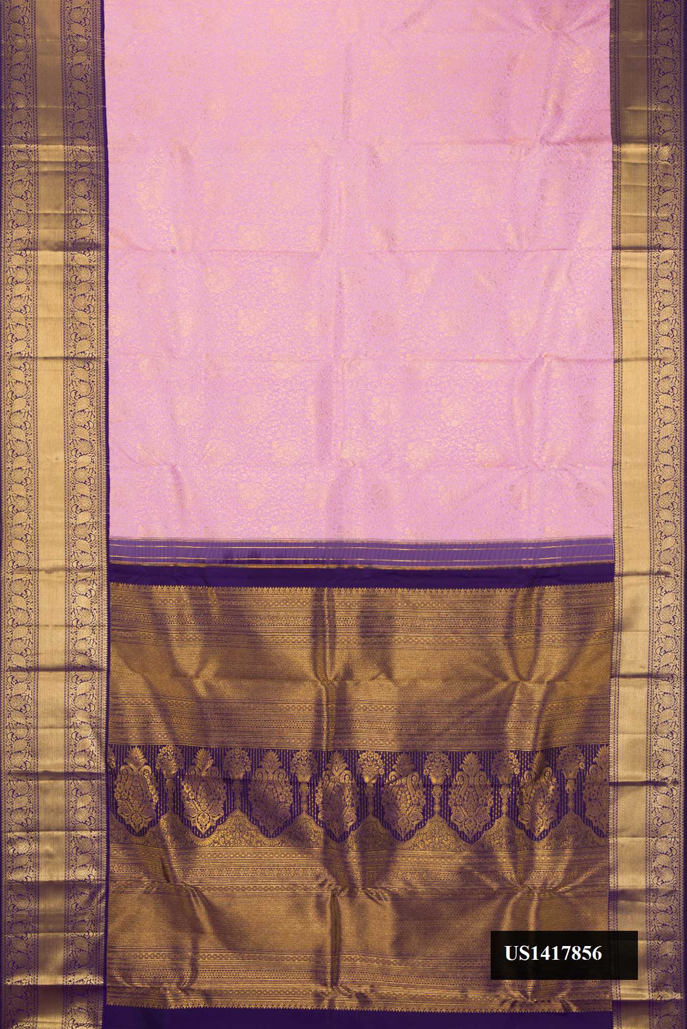 Lavender Dual Tone Kanchipuram Silk Saree with Zari Brocade on the body and Zari Border.  displayed on a mannequin