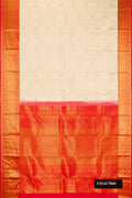Beige Dual Tone Kanchipuram Silk Saree with Zari Brocade on the body and Zari Border.  displayed on a mannequin