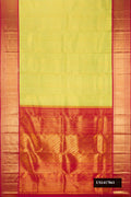 Parrot Green Dual Tone Kanchipuram Silk Saree with Zari Brocade on the body and Zari Border.  displayed on a mannequin