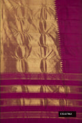 Magenta Dual Tone Kanchipuram Silk Saree with Plain Body and Rising Temple Border.  displayed on a mannequin