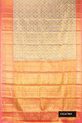 Gold Dual Tone Kanchipuram Tissue Silk Saree with Zari Brocade on the body and Zari Border.  displayed on a mannequin