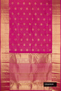 Magenta Dual Tone Kanchipuram Silk Saree with Stripes on the body and Zari Border.  displayed on a mannequin