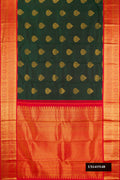 Bottle Green Dual Tone Kanchipuram Silk Saree with Zari Butta on the body and Zari Border.  displayed on a mannequin