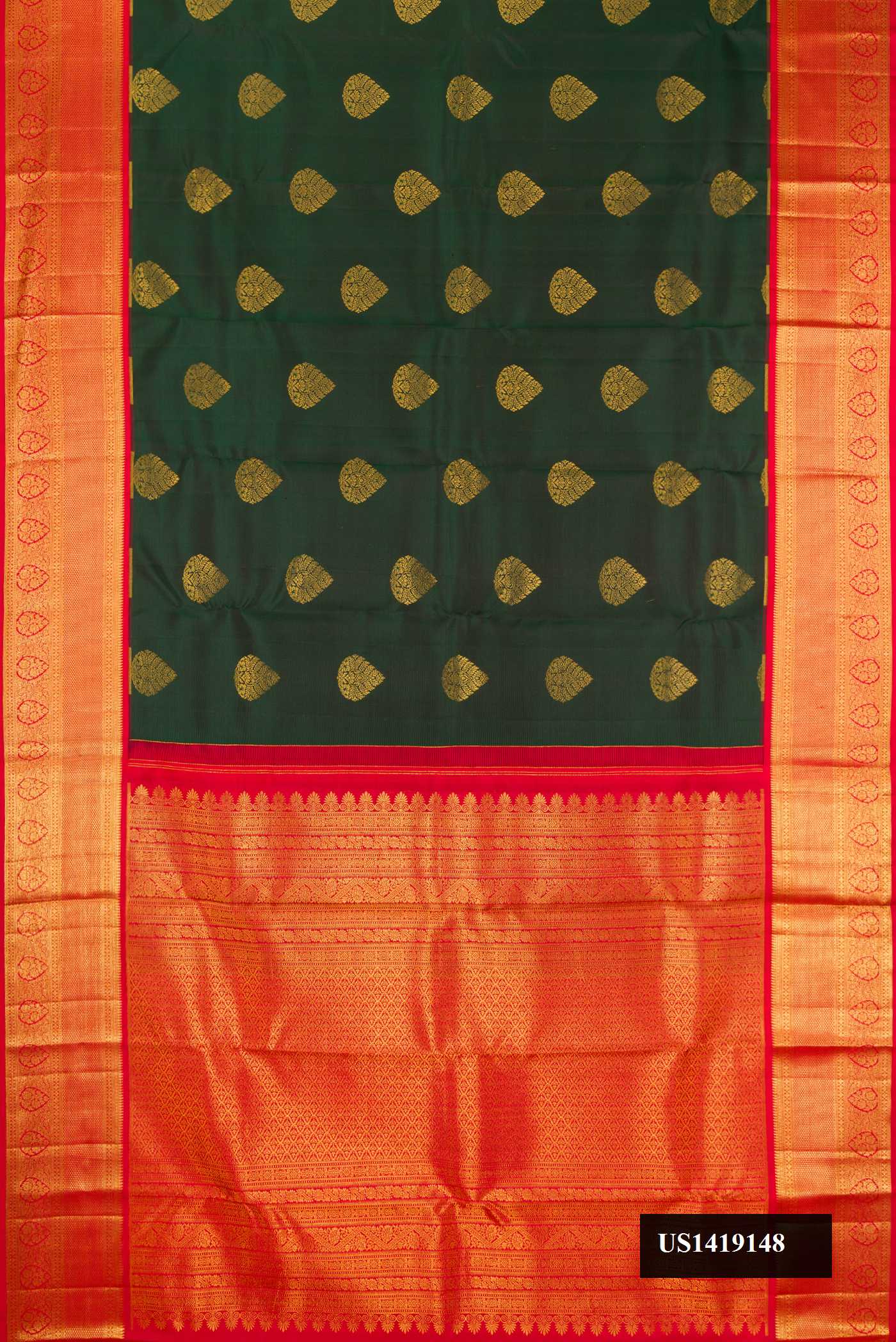 Bottle Green Dual Tone Kanchipuram Silk Saree with Zari Butta on the body and Zari Border.  displayed on a mannequin