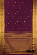 Burgundy Dual Tone Kanchipuram Silk Saree with Zari Butta on the body and Zari Border.  displayed on a mannequin