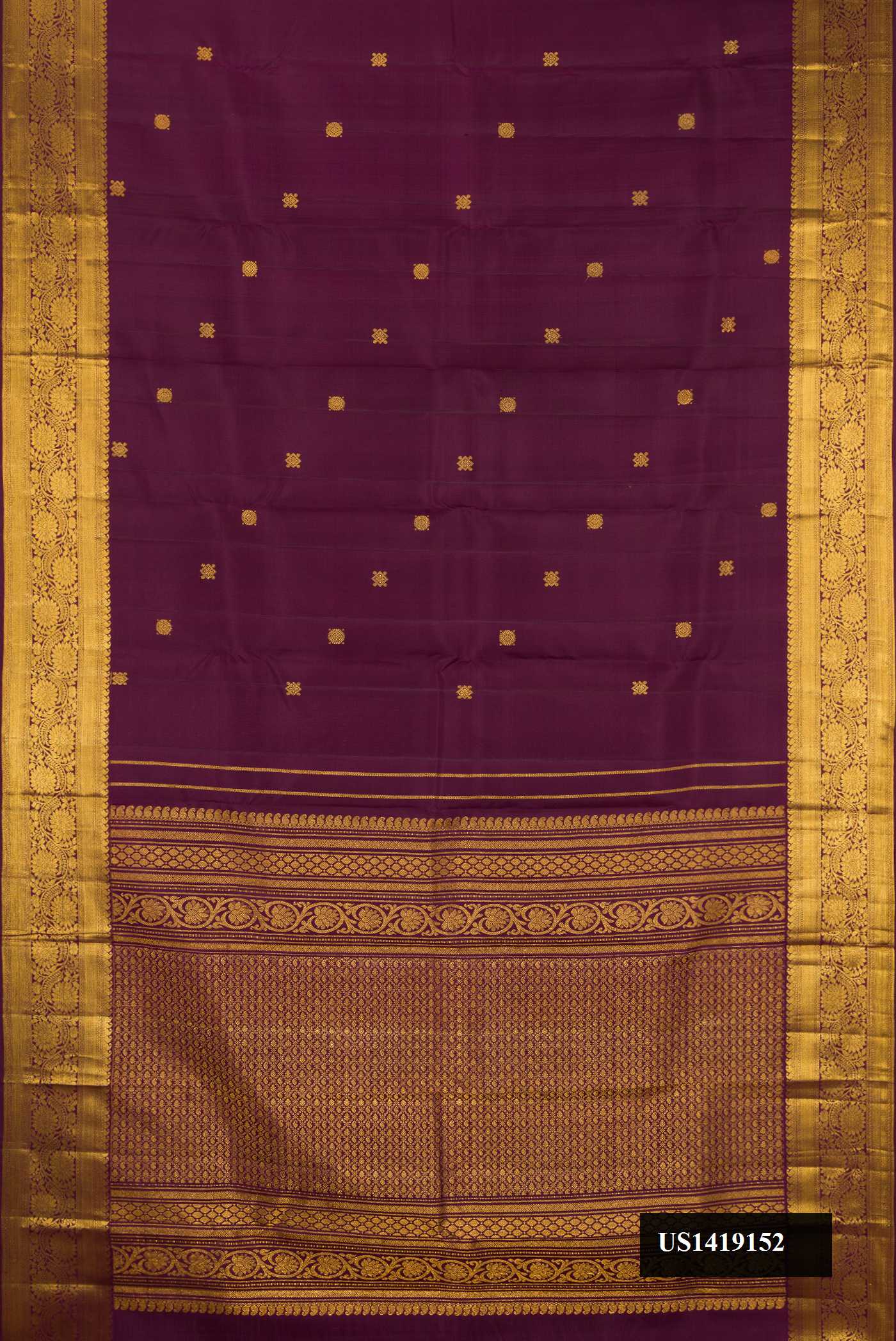 Burgundy Dual Tone Kanchipuram Silk Saree with Zari Butta on the body and Zari Border.  displayed on a mannequin