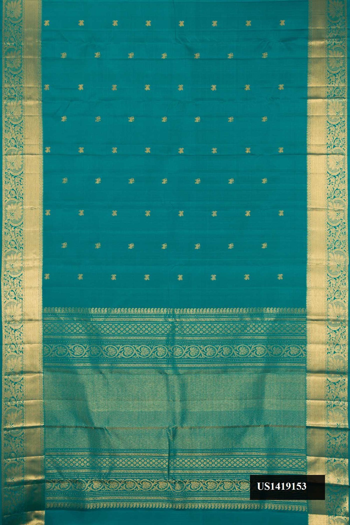 Peacock Blue Dual Tone Kanchipuram Silk Saree with Zari Butta on the body and Zari Border.  displayed on a mannequin