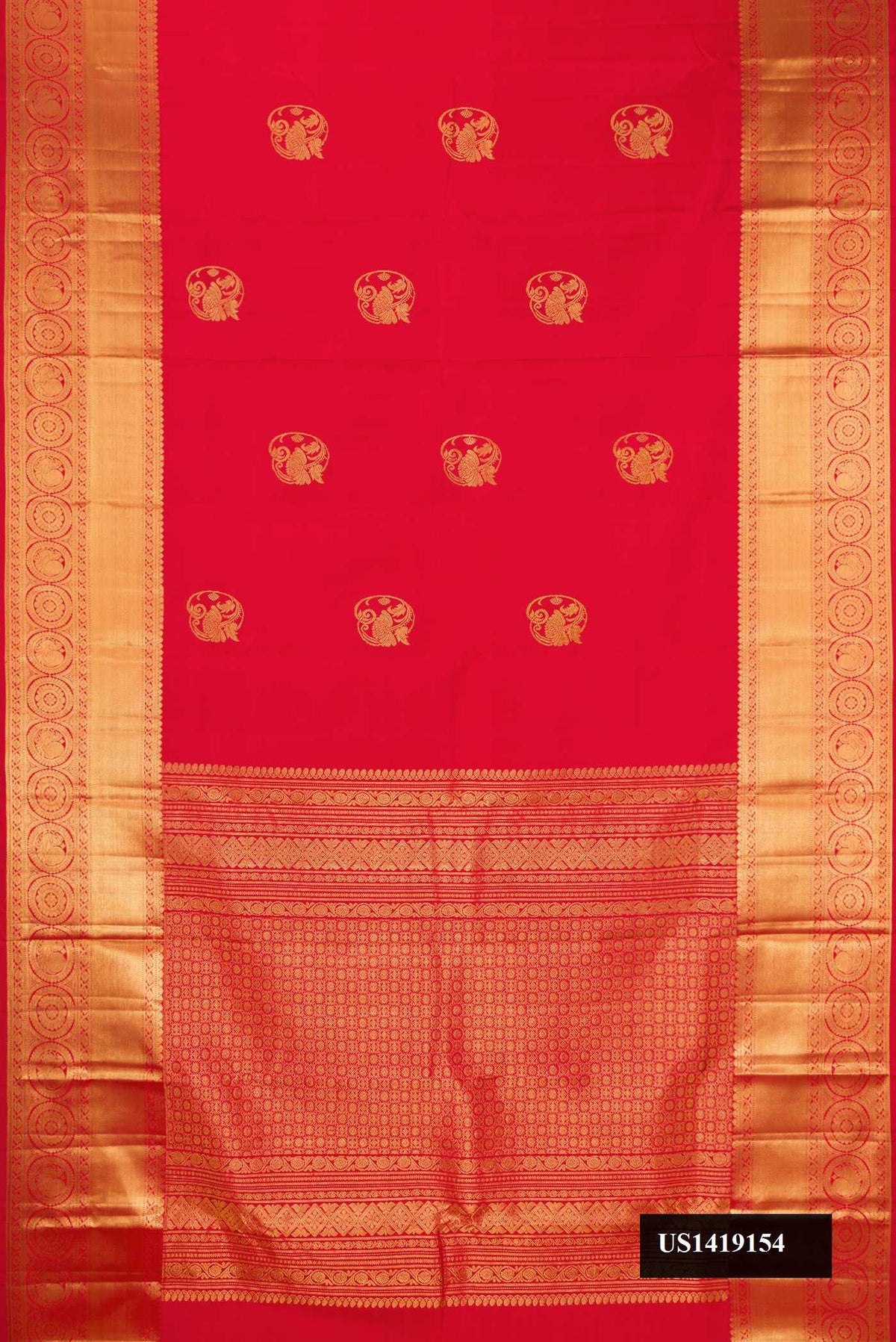 Red Dual Tone Kanchipuram Silk Saree with Zari Butta on the body and Zari Border.  displayed on a mannequin