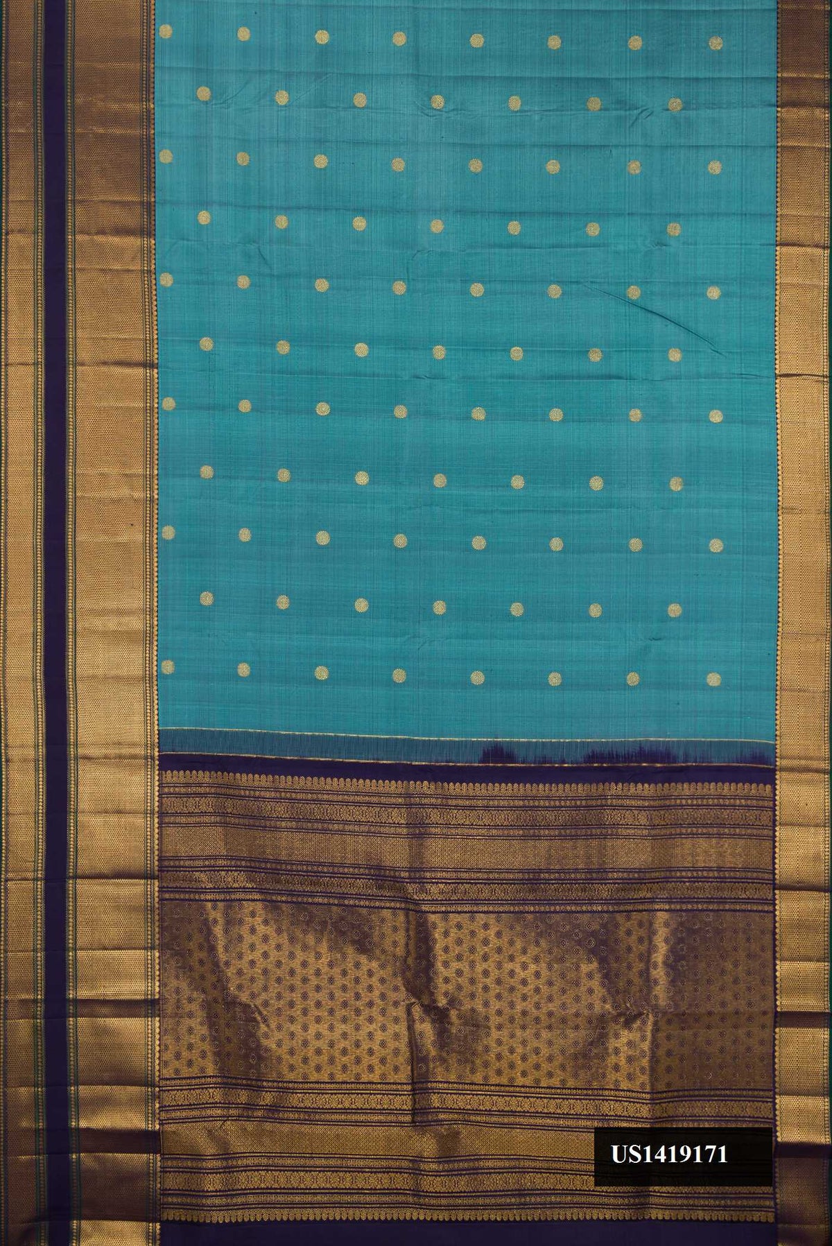 Light Blue Dual Tone Kanchipuram Silk Saree with Zari Butta on the body and Zari Border.  displayed on a mannequin