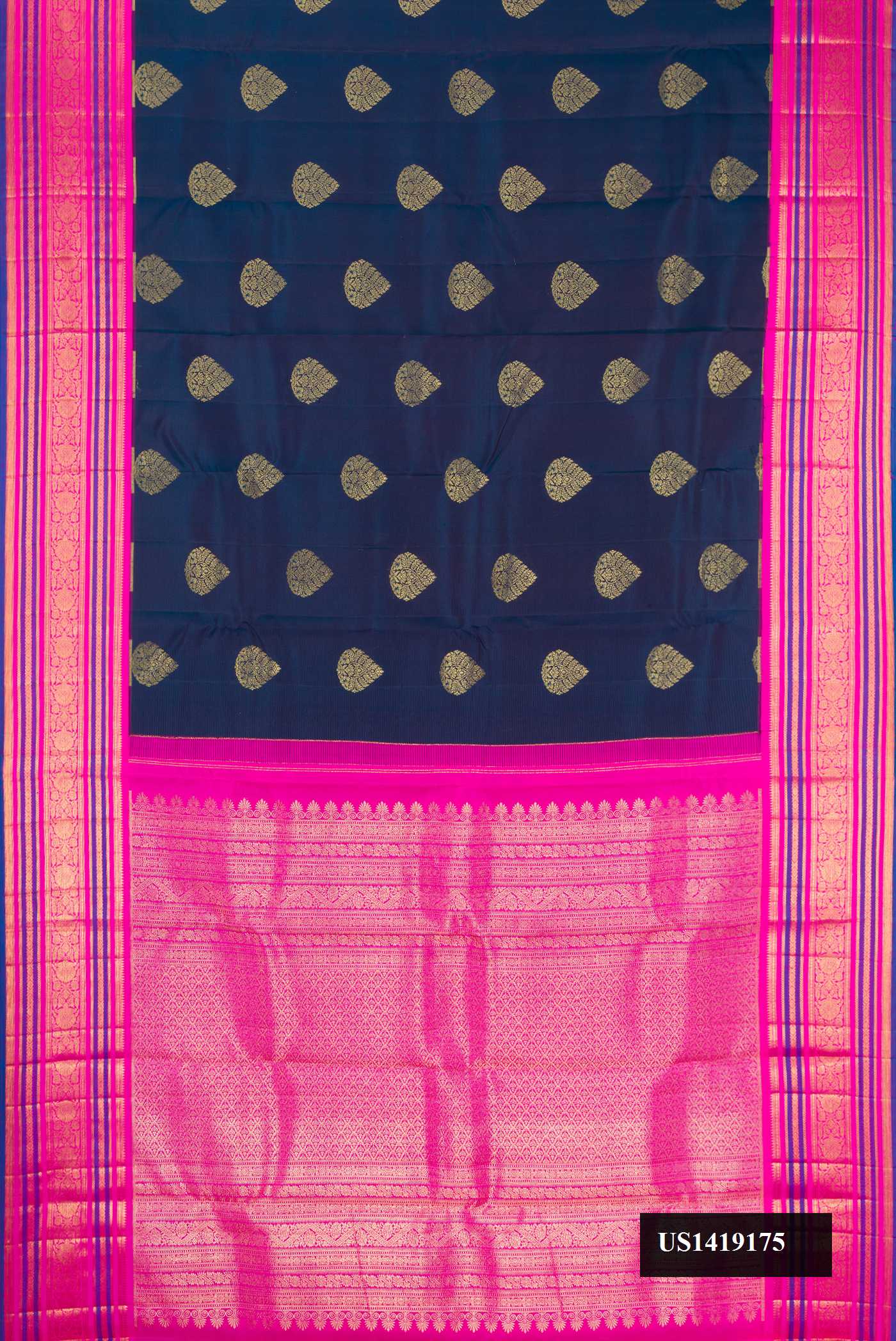 Navy Blue Dual Tone Kanchipuram Silk Saree with Zari Butta on the body and Fancy Border.  displayed on a mannequin