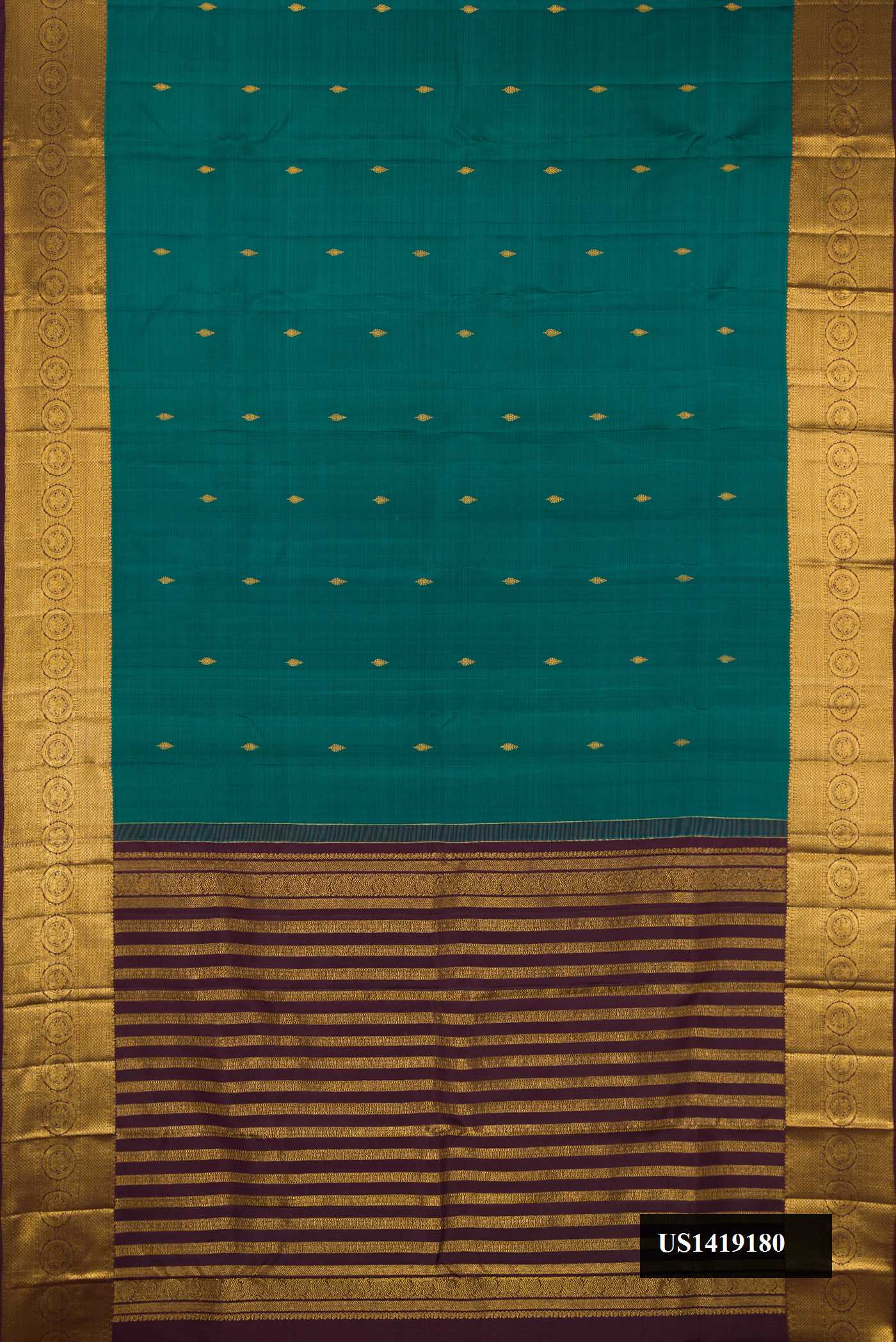 Green Dual Tone Kanchipuram Silk Saree with Zari Butta on the body and Fancy Border.  displayed on a mannequin