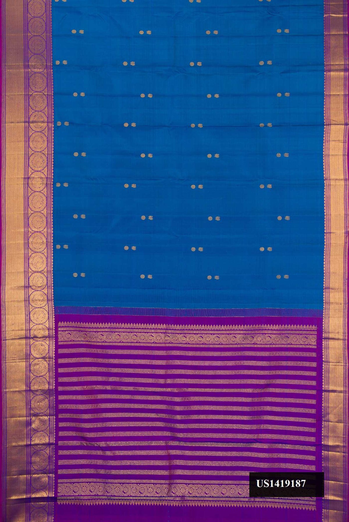Peacock Blue Dual Tone Kanchipuram Silk Saree with Zari Butta on the body and Zari Border.  displayed on a mannequin