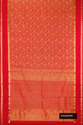 Red Dual Tone Kanchipuram Silk Saree with Zari Brocade on the body and Zari Border.  displayed on a mannequin
