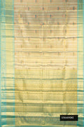Gold Dual Tone Kanchipuram Tissue Silk Saree with Zari Brocade on the body and Fancy Border.  displayed on a mannequin