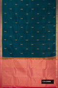 Green Dual Tone Kanchipuram Silk Saree with Zari Butta on the body and Zari Border.  displayed on a mannequin