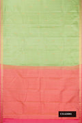 Pista Green Dual Tone Kanchipuram Silk Saree with Zari Butta on the body and Zari Border.  displayed on a mannequin
