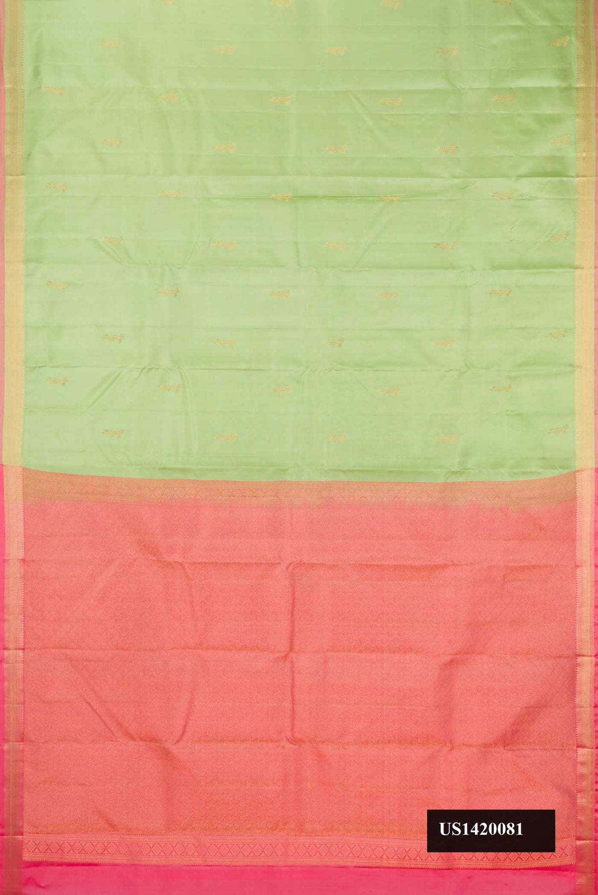 Pista Green Dual Tone Kanchipuram Silk Saree with Zari Butta on the body and Zari Border.  displayed on a mannequin