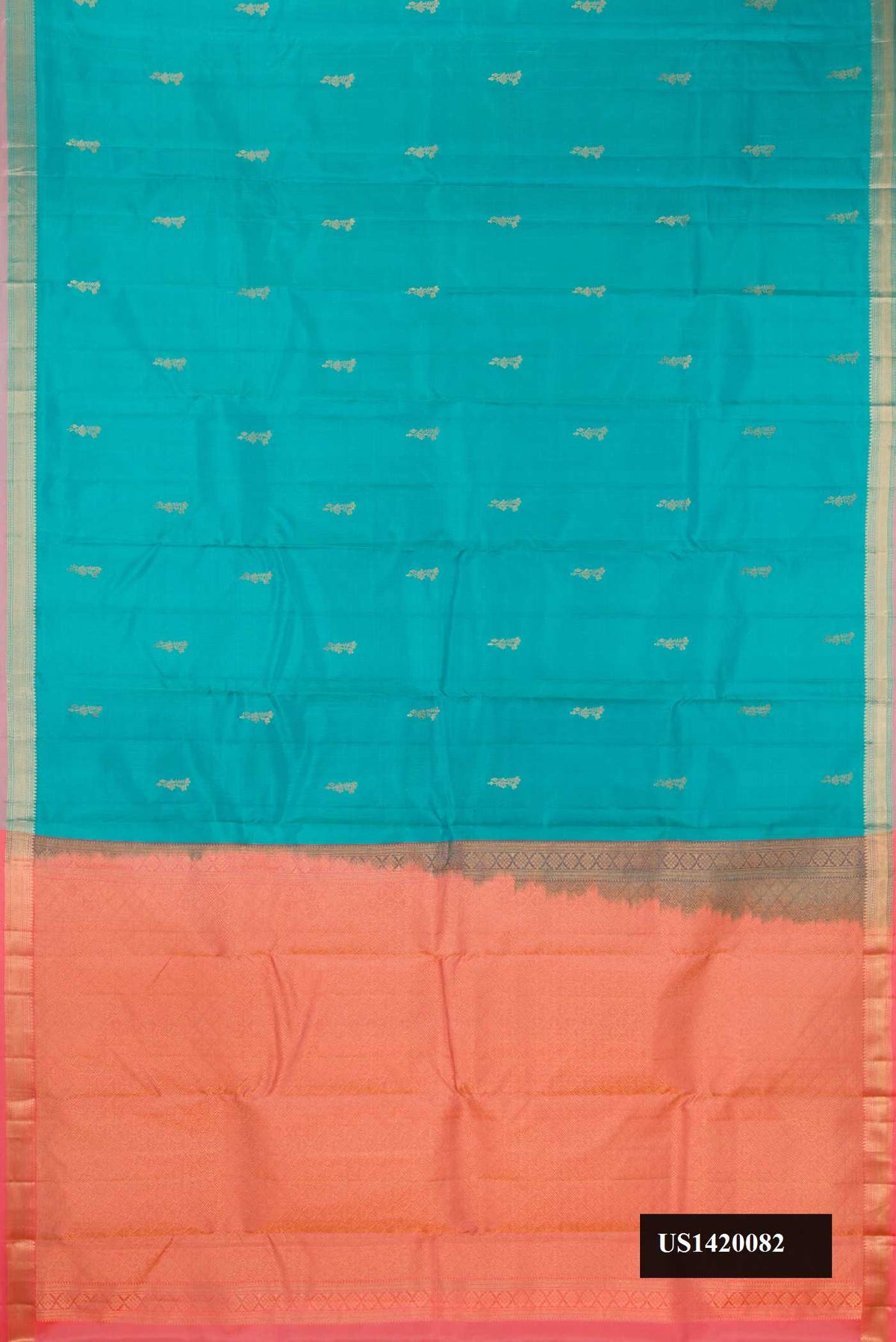 Blue Dual Tone Kanchipuram Silk Saree with Zari Butta on the body and Zari Border.  displayed on a mannequin