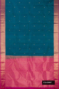 Peacock Blue Dual Tone Kanchipuram Silk Saree with Zari Butta on the body and Zari Border.  displayed on a mannequin