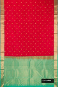 Red Dual Tone Kanchipuram Silk Saree with Zari Butta on the body and Zari Border.  displayed on a mannequin