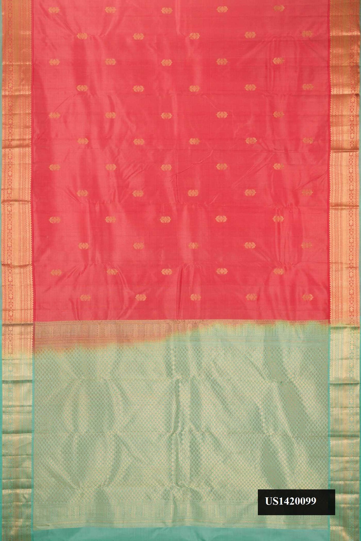 Rose Gold Dual Tone Kanchipuram Silk Saree with Zari Butta on the body and Zari Border.  displayed on a mannequin