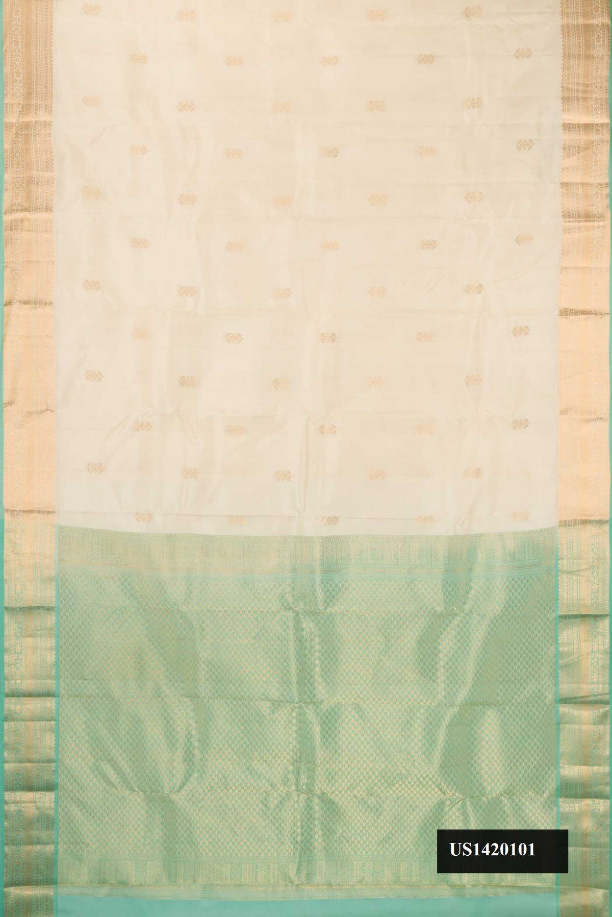Beige Dual Tone Kanchipuram Silk Saree with Zari Butta on the body and Zari Border.  displayed on a mannequin