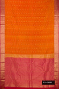 Mustard Dual Tone Kanchipuram Silk Saree with Zari Butta on the body and Zari Border.  displayed on a mannequin