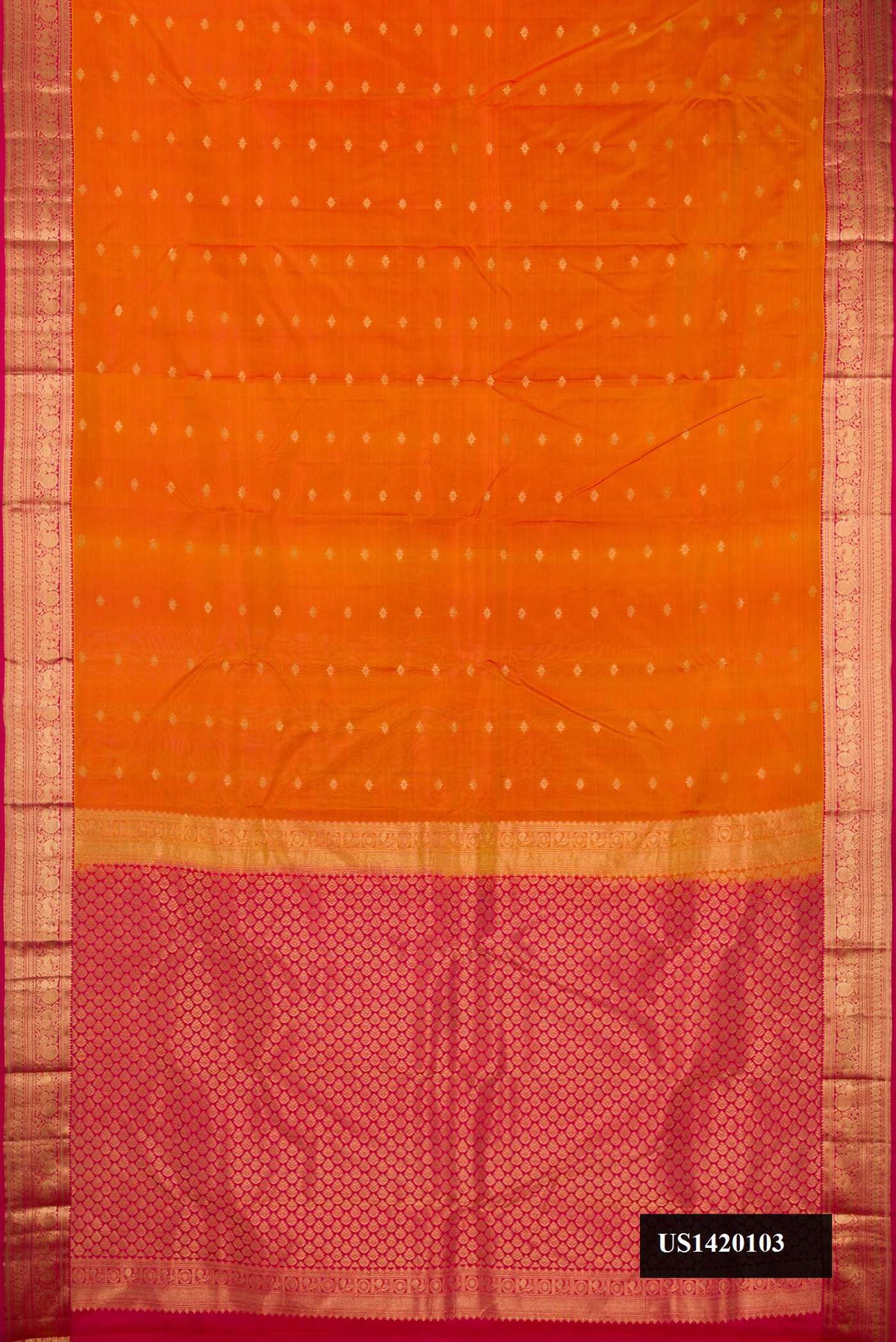 Mustard Dual Tone Kanchipuram Silk Saree with Zari Butta on the body and Zari Border.  displayed on a mannequin