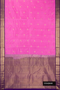 Rose pink Dual Tone Kanchipuram Silk Saree with Zari Butta on the body and Zari Border.  displayed on a mannequin