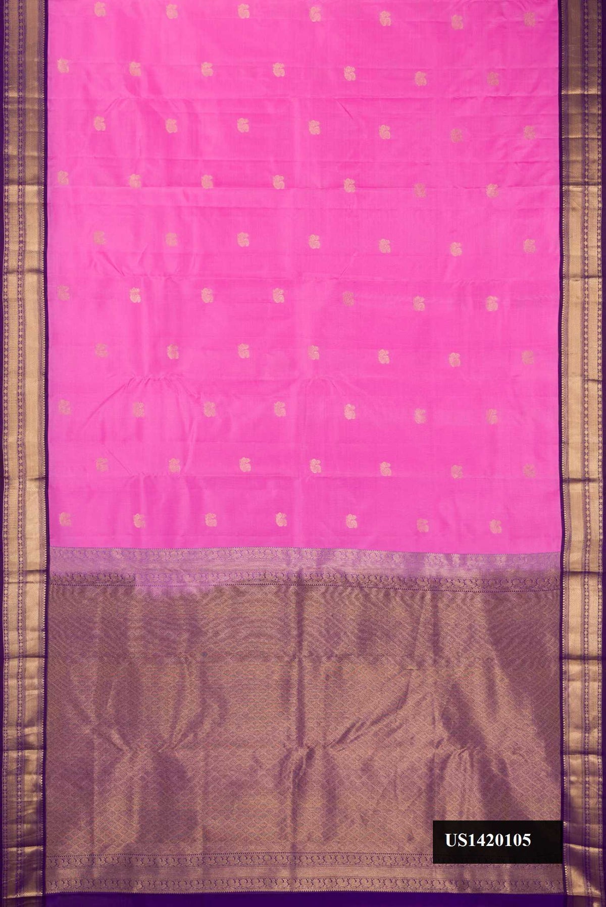Rose pink Dual Tone Kanchipuram Silk Saree with Zari Butta on the body and Zari Border.  displayed on a mannequin