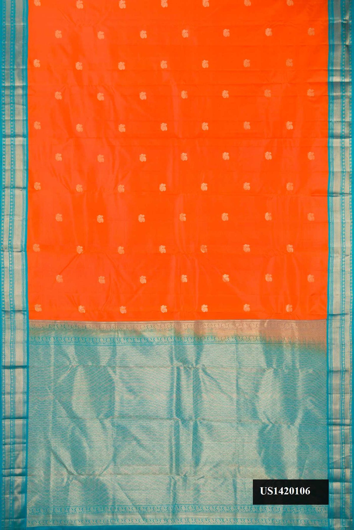 Orange Dual Tone Kanchipuram Silk Saree with Zari Butta on the body and Zari Border.  displayed on a mannequin