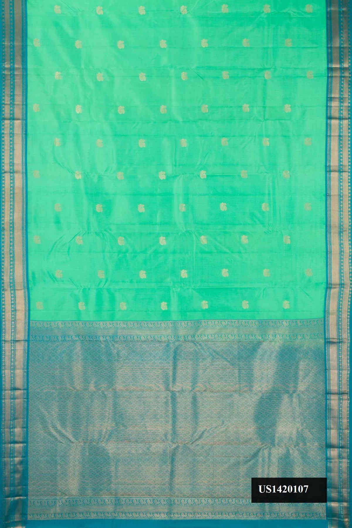 Sea Green Dual Tone Kanchipuram Silk Saree with Zari Butta on the body and Zari Border.  displayed on a mannequin