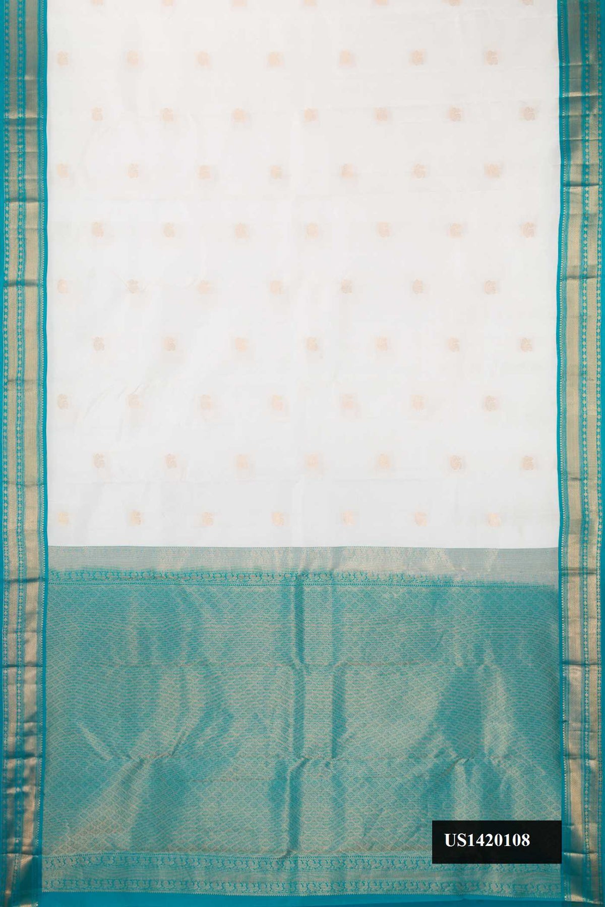 Off White Dual Tone Kanchipuram Silk Saree with Zari Butta on the body and Zari Border.  displayed on a mannequin