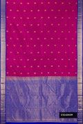 Magenta Dual Tone Kanchipuram Silk Saree with Zari Butta on the body and Zari Border.  displayed on a mannequin