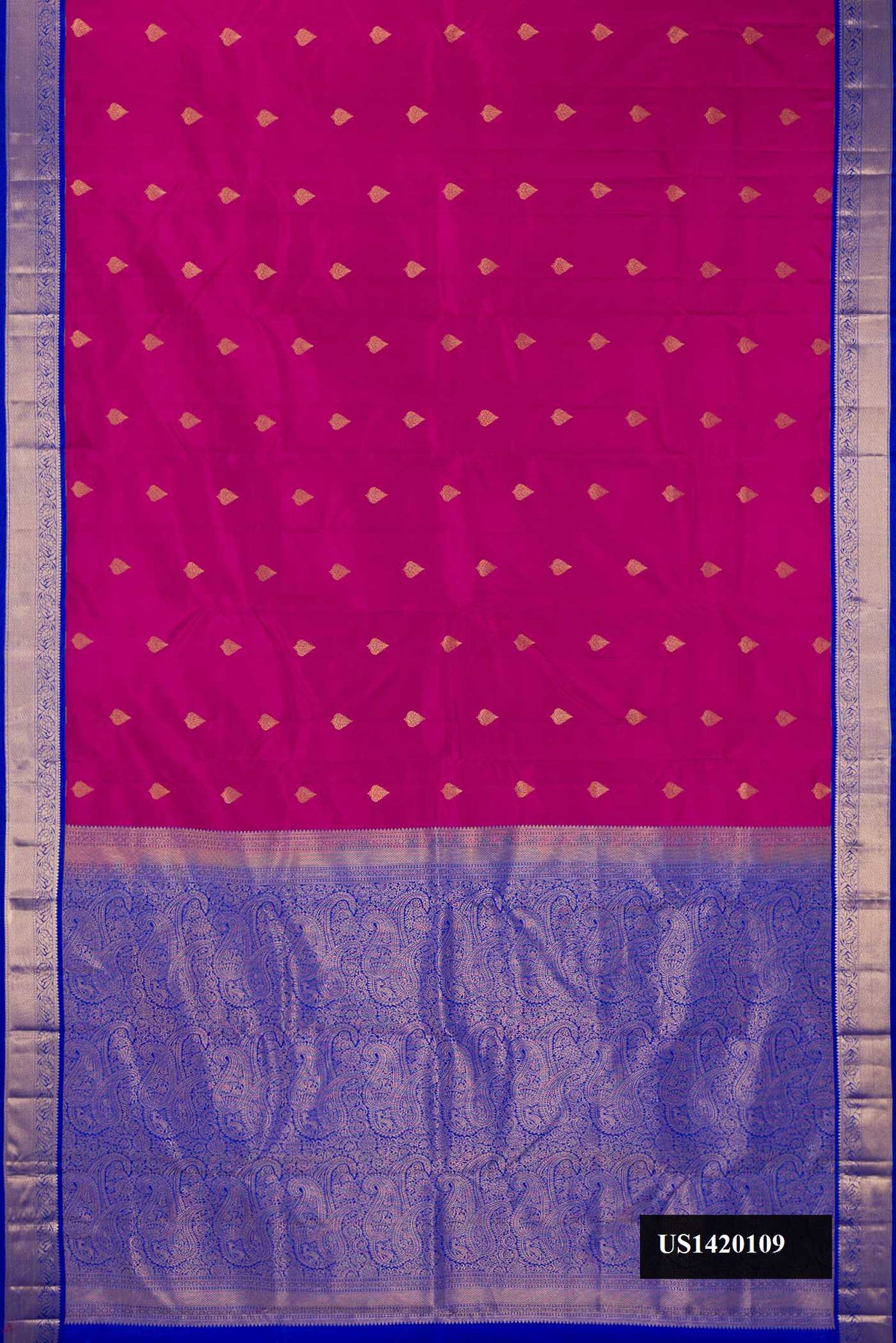 Magenta Dual Tone Kanchipuram Silk Saree with Zari Butta on the body and Zari Border.  displayed on a mannequin