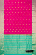 Pink Dual Tone Kanchipuram Silk Saree with Zari Butta on the body and Zari Border.  displayed on a mannequin
