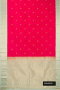 Dark Pink Dual Tone Kanchipuram Silk Saree with Zari Butta on the body and Zari Border.  displayed on a mannequin