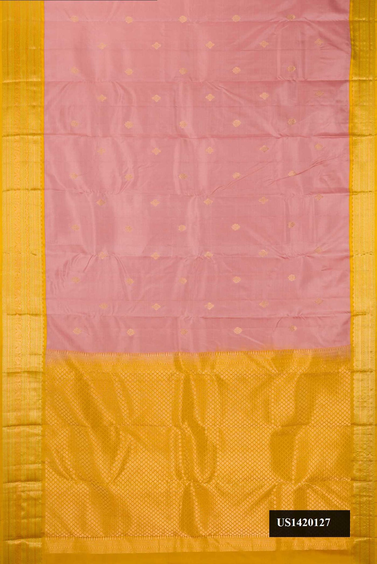Rose Gold Dual Tone Kanchipuram Silk Saree with Zari Butta on the body and Zari Border.  displayed on a mannequin