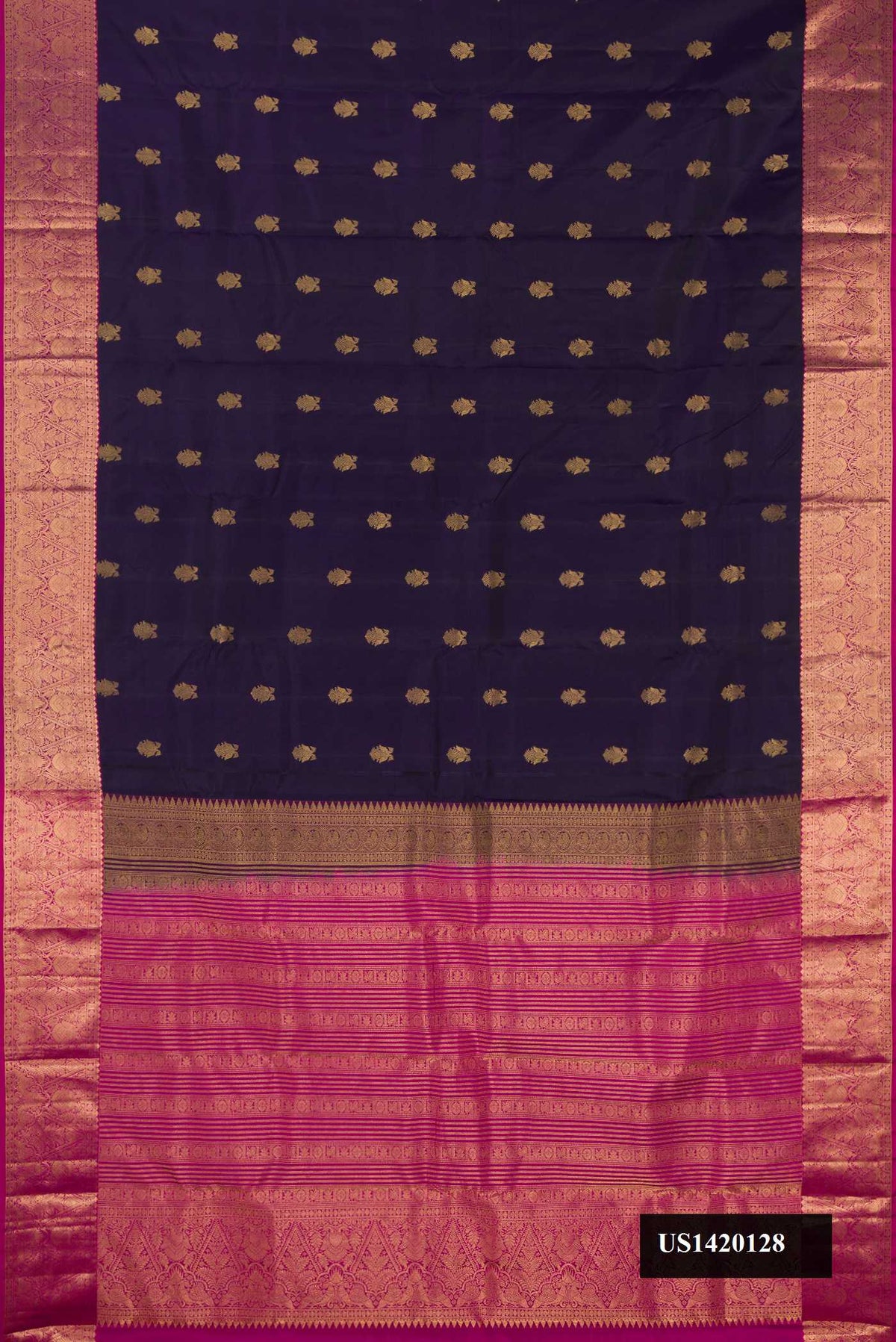 Navy Blue Dual Tone Kanchipuram Silk Saree with Zari Butta on the body and Zari Border.  displayed on a mannequin