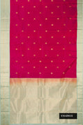 Maroon Dual Tone Kanchipuram Silk Saree with Zari Butta on the body and Zari Border.  displayed on a mannequin