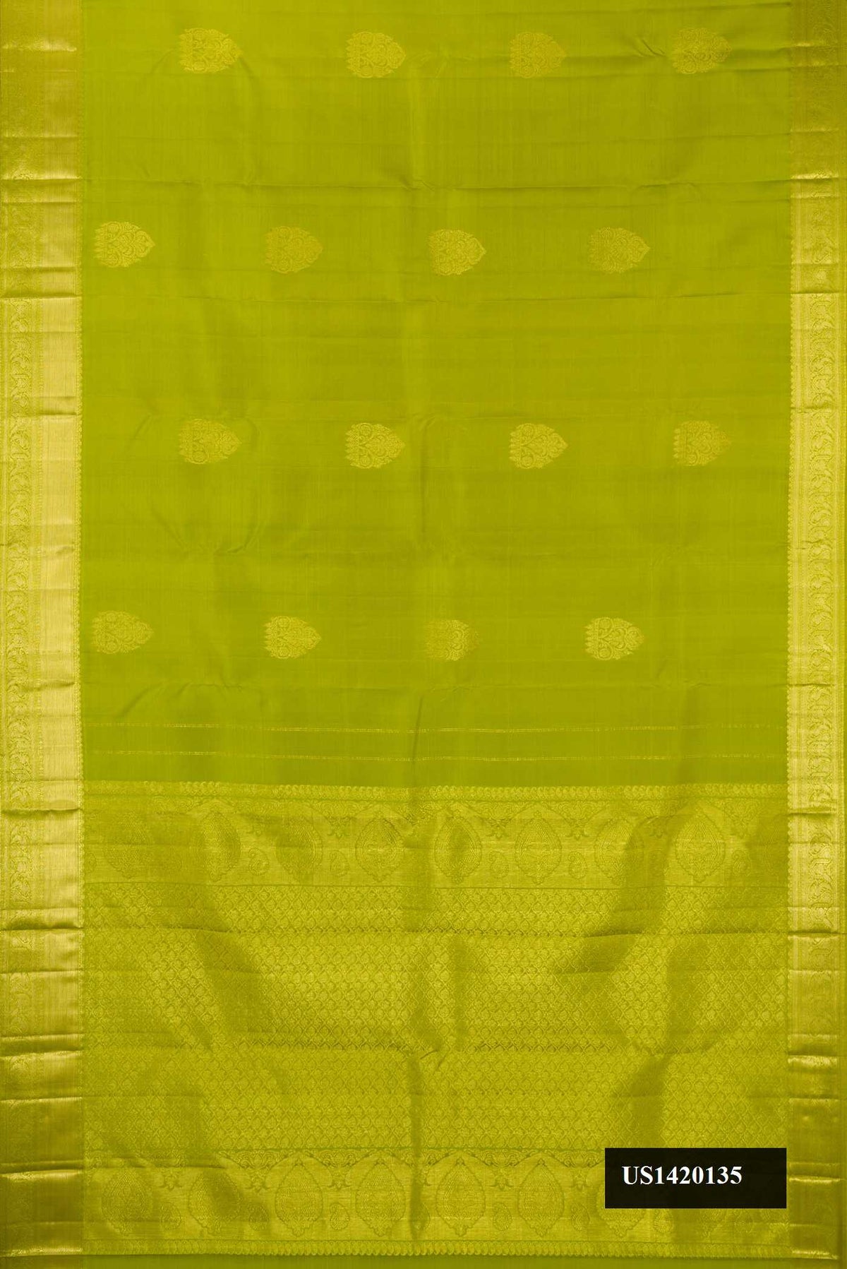 Parrot Green Dual Tone Kanchipuram Silk Saree with Zari Butta on the body and Zari Border.  displayed on a mannequin