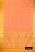 Golden Peach Dual Tone Kanchipuram Silk Saree with Zari Butta on the body and Zari Border.  displayed on a mannequin