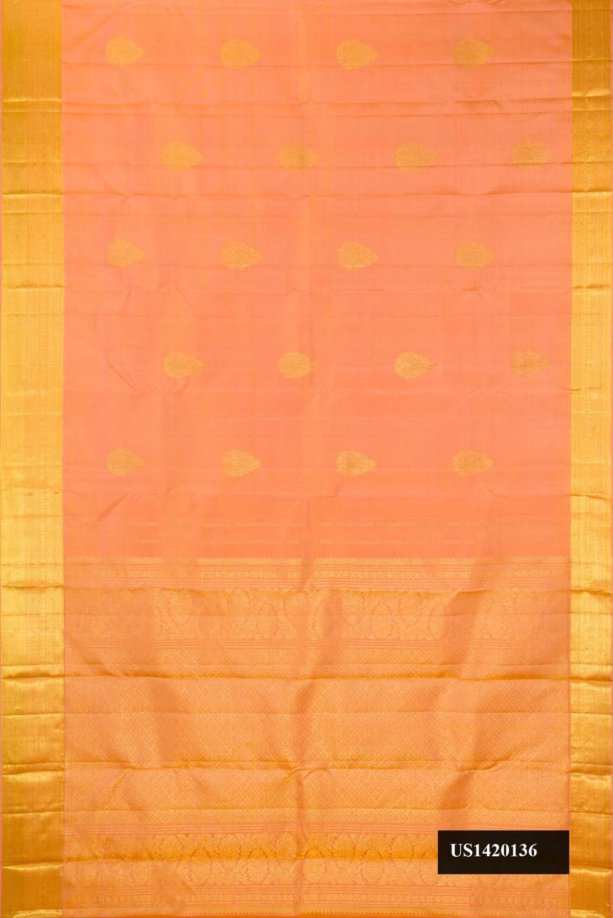 Golden Peach Dual Tone Kanchipuram Silk Saree with Zari Butta on the body and Zari Border.  displayed on a mannequin