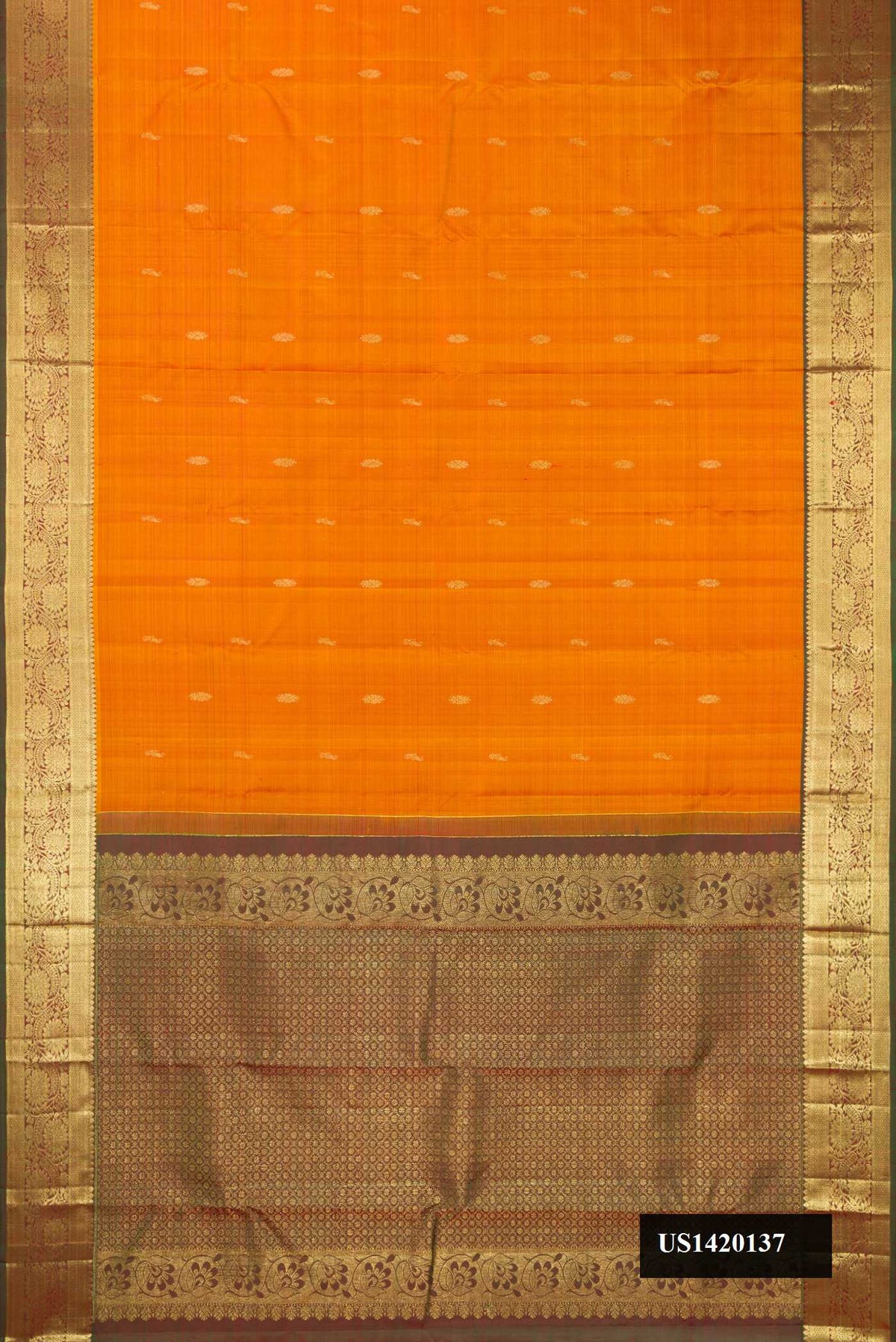 Mustard Dual Tone Kanchipuram Silk Saree with Zari Butta on the body and Zari Border.  displayed on a mannequin