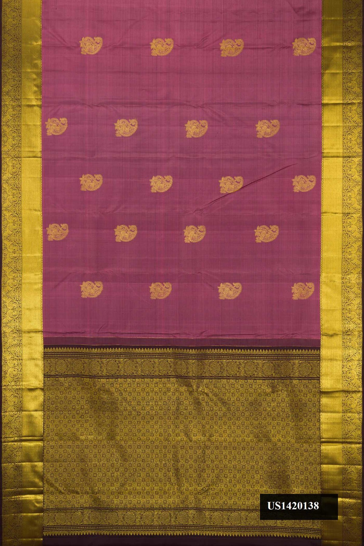 Rose Gold Dual Tone Kanchipuram Silk Saree with Zari Butta on the body and Zari Border.  displayed on a mannequin