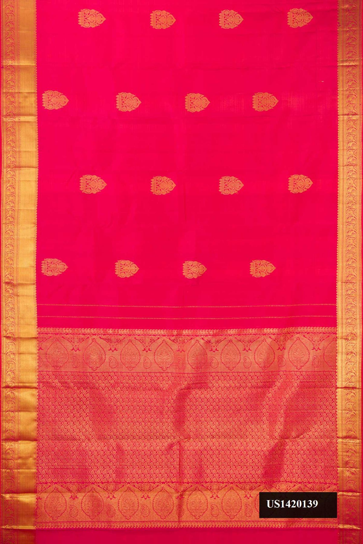 Coral Dual Tone Kanchipuram Silk Saree with Zari Butta on the body and Zari Border.  displayed on a mannequin