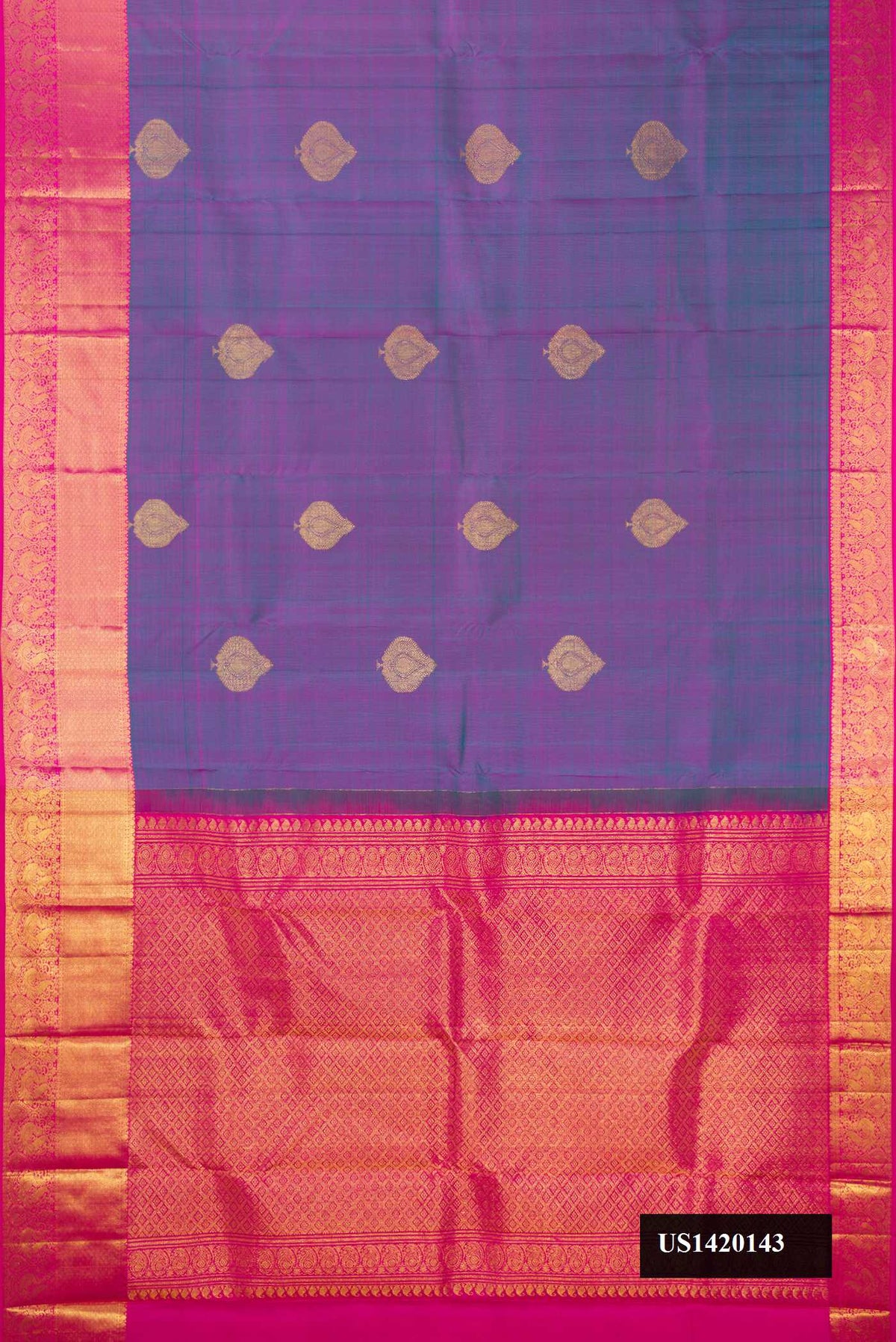 Peacock Blue Dual Tone Kanchipuram Silk Saree with Zari Butta on the body and Zari Border.  displayed on a mannequin