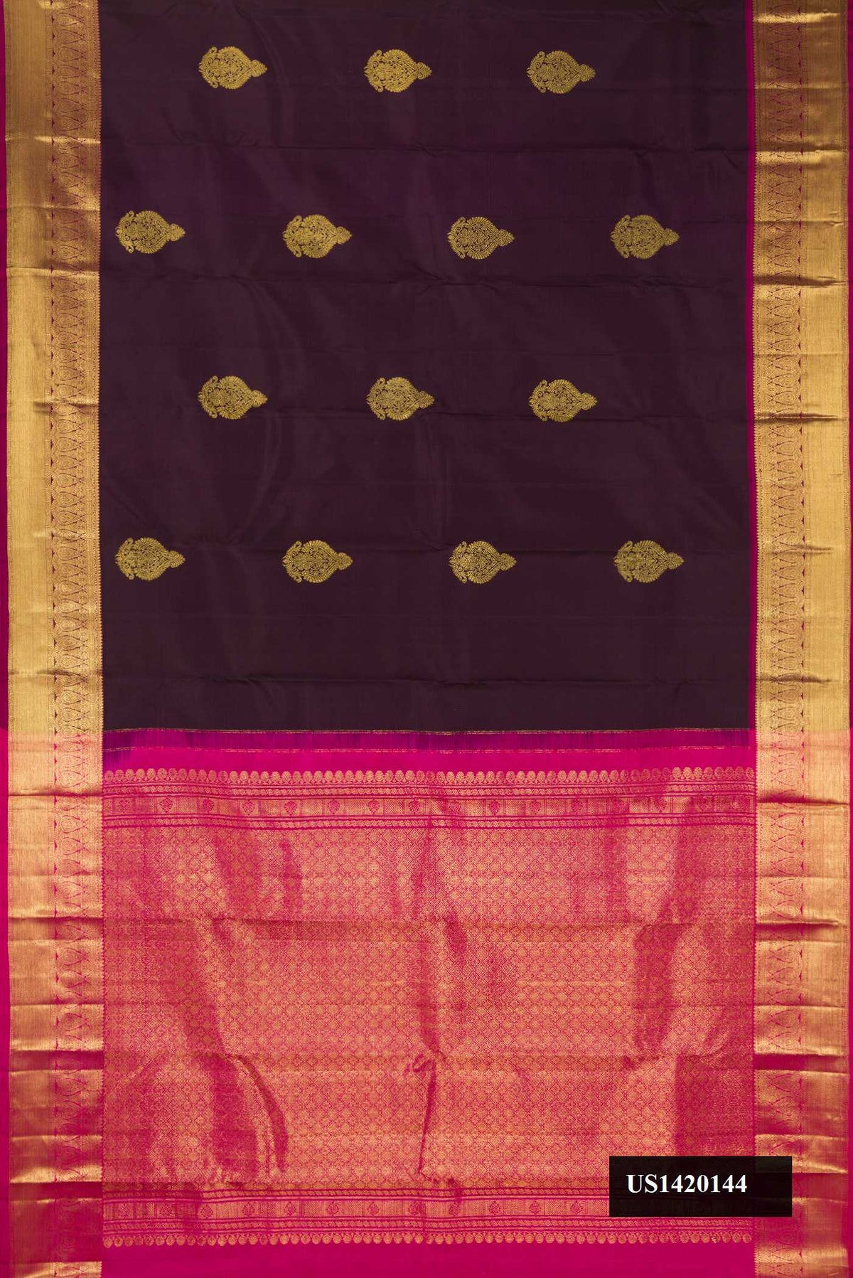 Burgundy Dual Tone Kanchipuram Silk Saree with Zari Butta on the body and Zari Border.  displayed on a mannequin